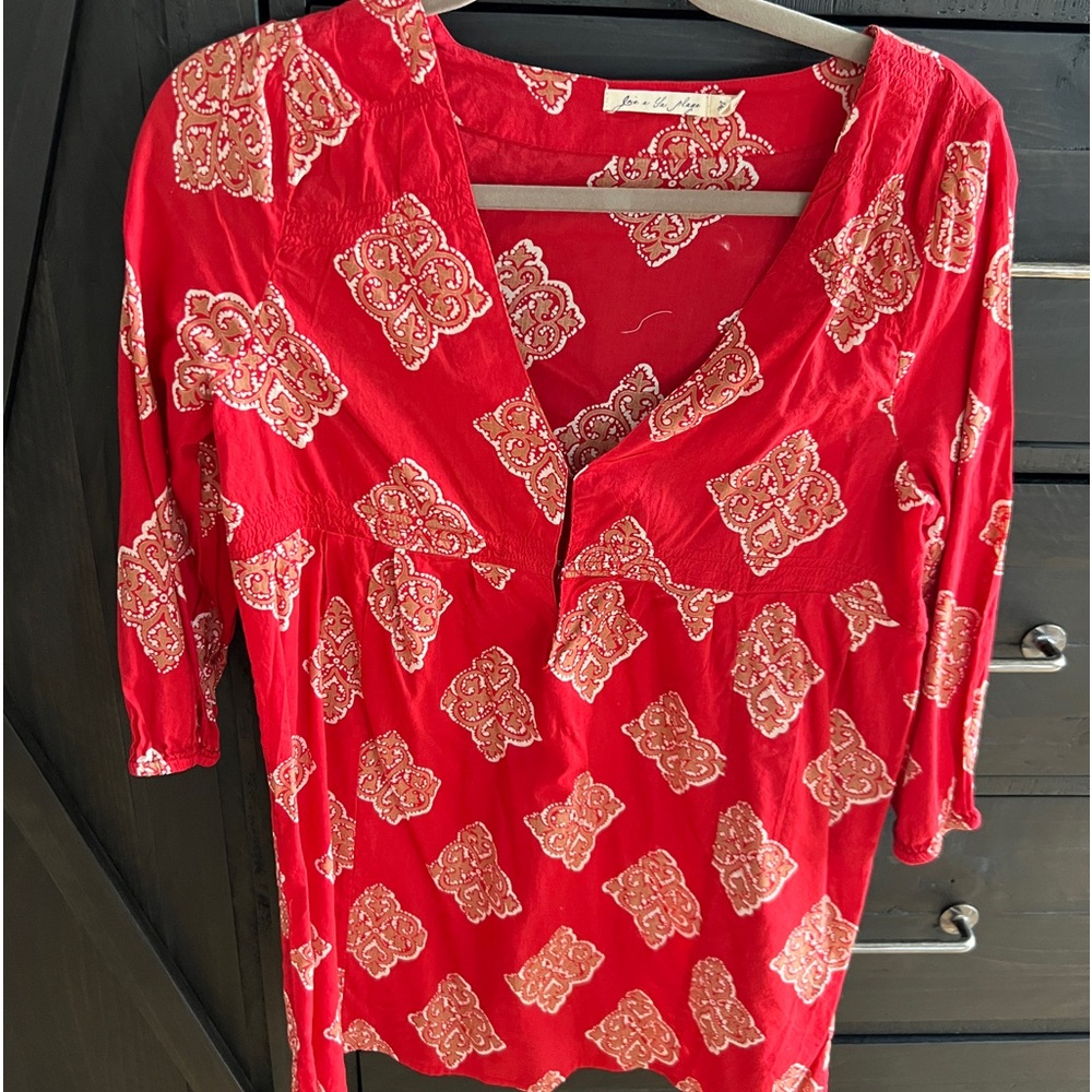 Tunic or bathing suit coverup.